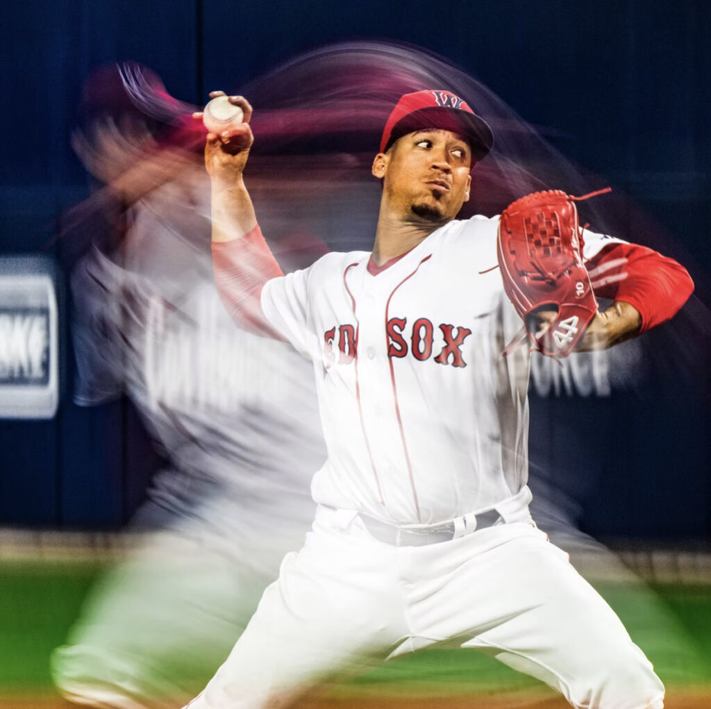 A Red Sox pitcher throws a ball