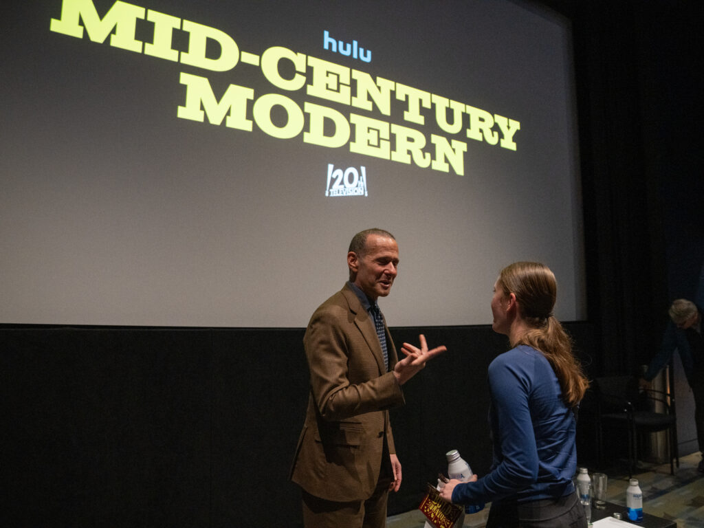 Max Mutchnik speaks to a student