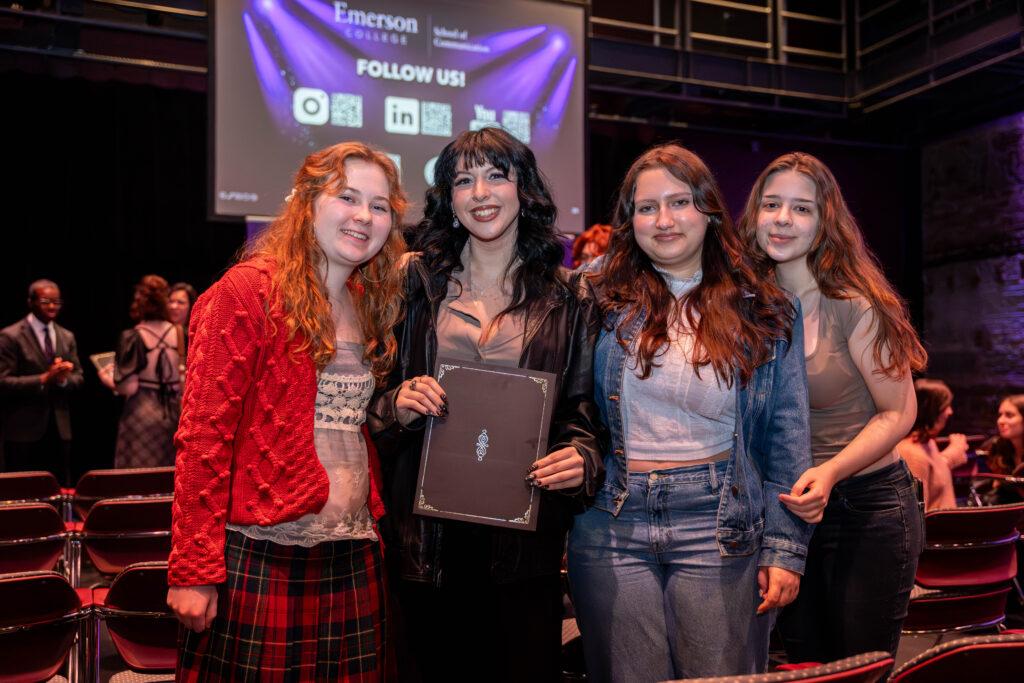 Awardee and her peers pose for a photo after the ceremony.