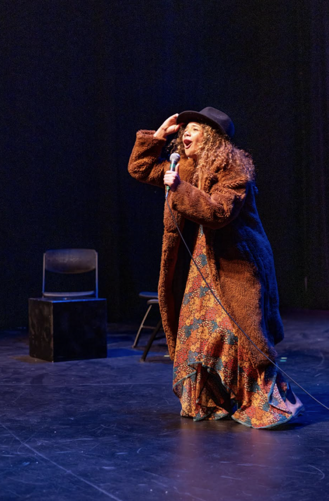Sophie Canon sings on stage