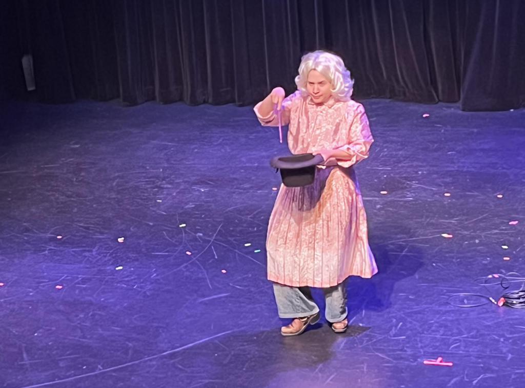 Tam Silverman performs as Pam the magician