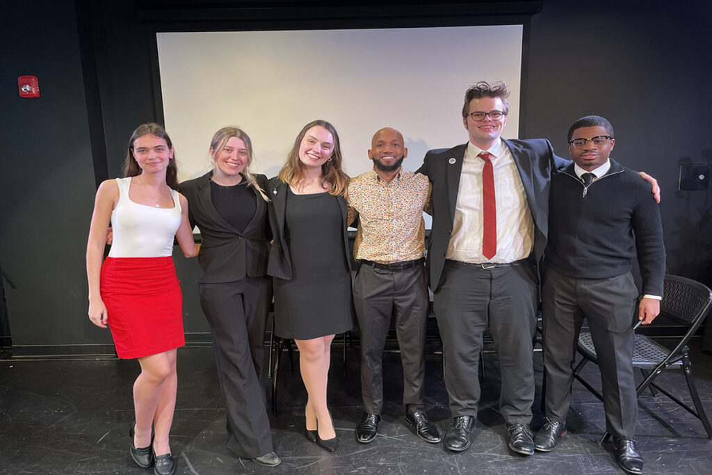 Kayla Armbruster, Olivia DeCesare, Stella Del Tergo, Deion Hawkins, Henry Jones, Oluwatimileyin (Timi) Oladunjoye pose for a photo
