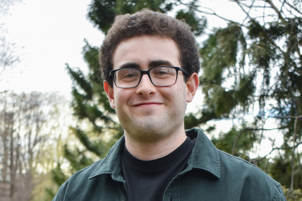 Jack Reisman with trees in background