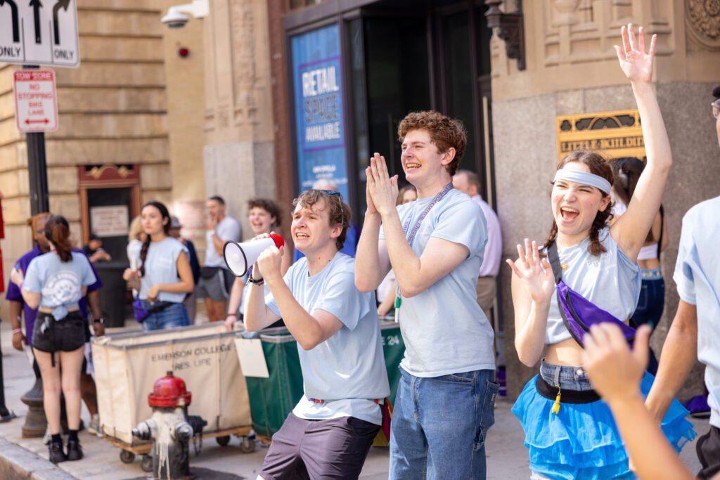 Orientation Leaders cheering on new students. 