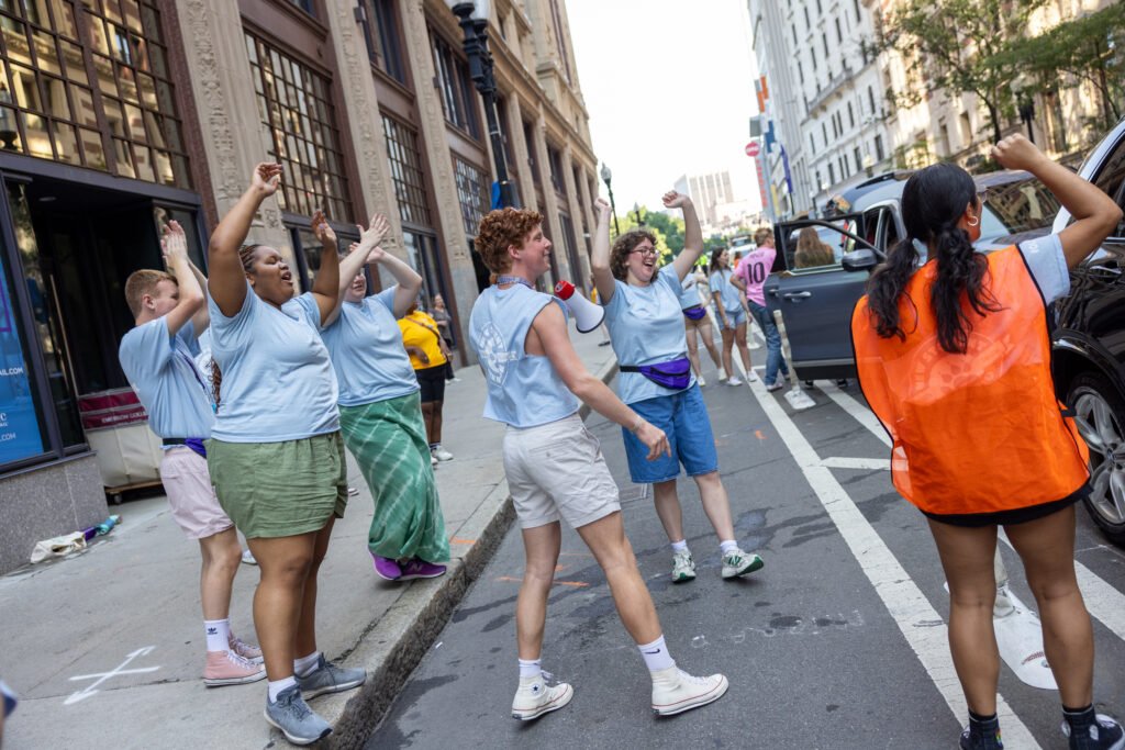 Orientation leaders cheering.