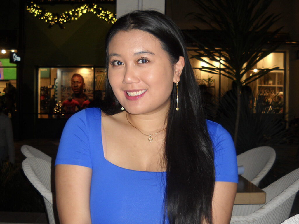 Vivian Nguyen on patio at night