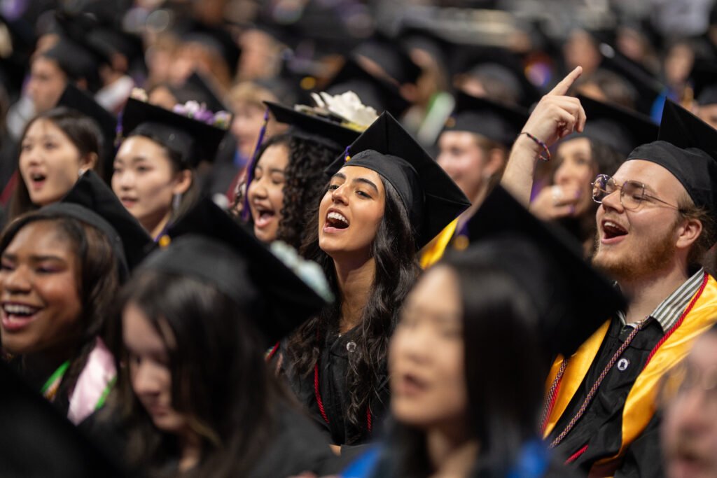 A sea of Emerson students sit