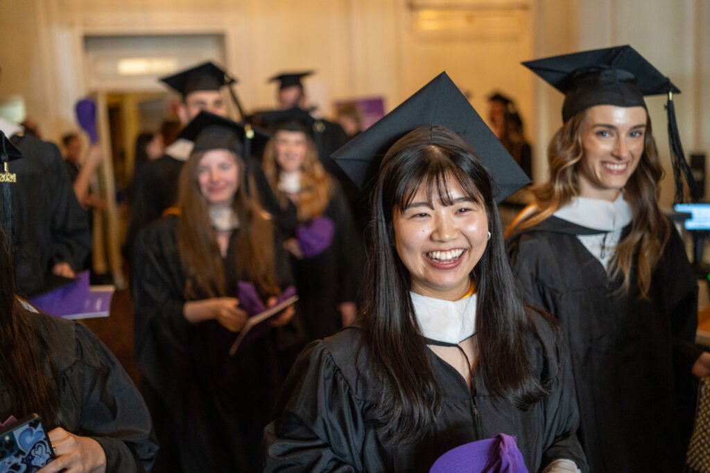 Grad smiling for photo