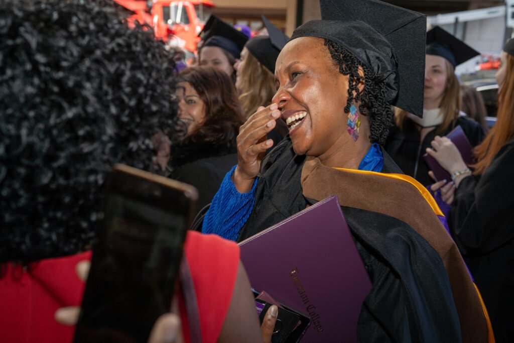 Grads smile and celebrate