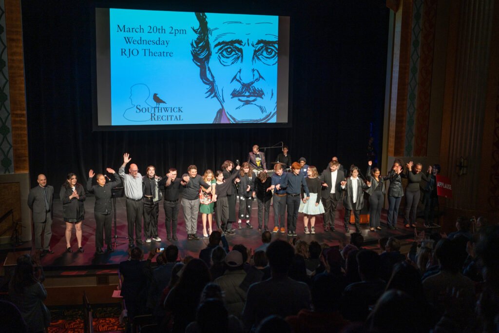 All performers receiving applause on stage.