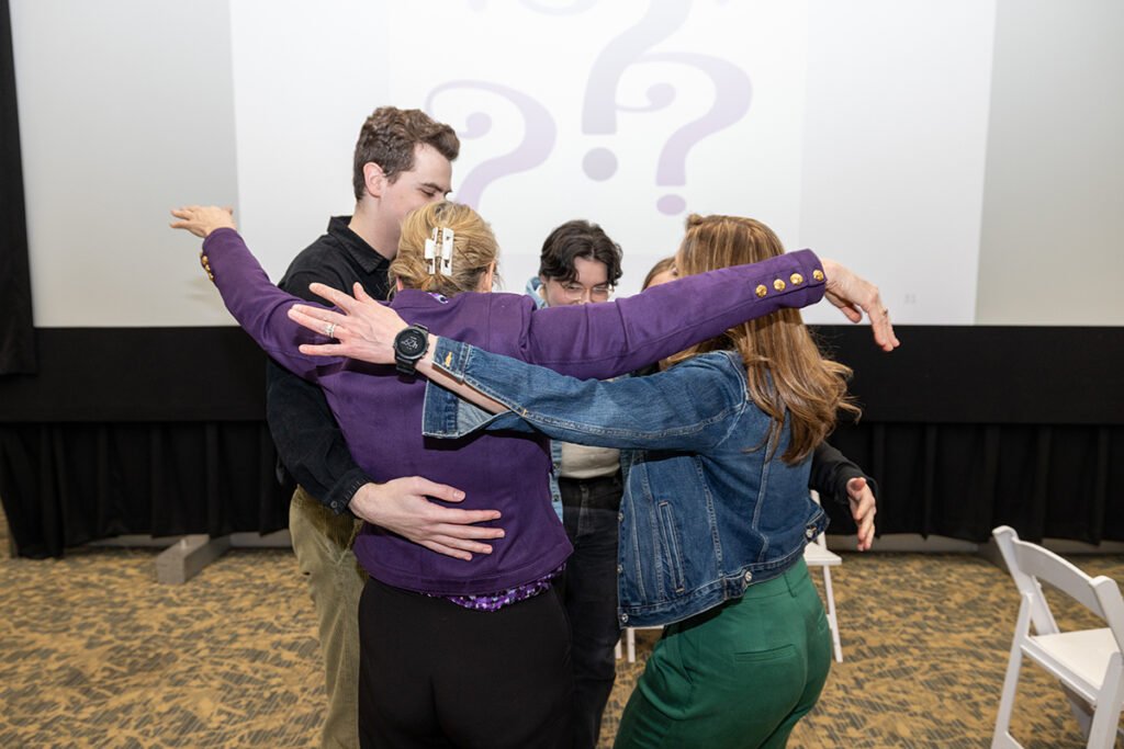 Group of people hug