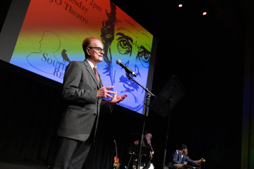 Greg Payne speaks to the audience