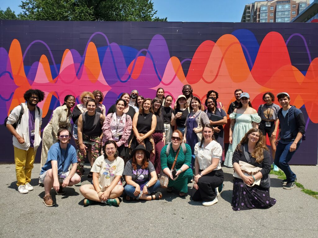 A group photo of about 30 people