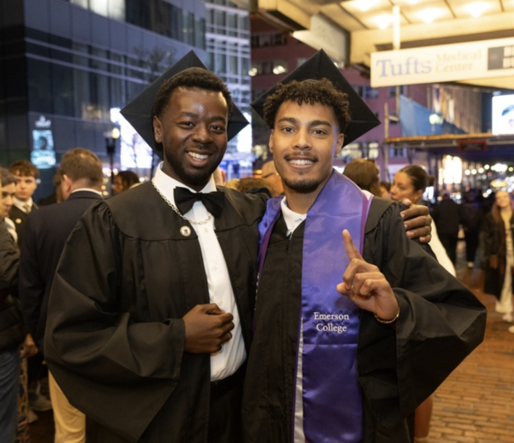 Two students pose for a photo
