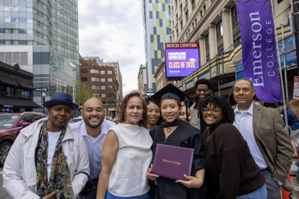 A graduate with a group of family