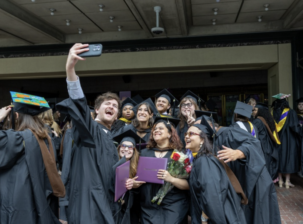 Graduates take a selfie