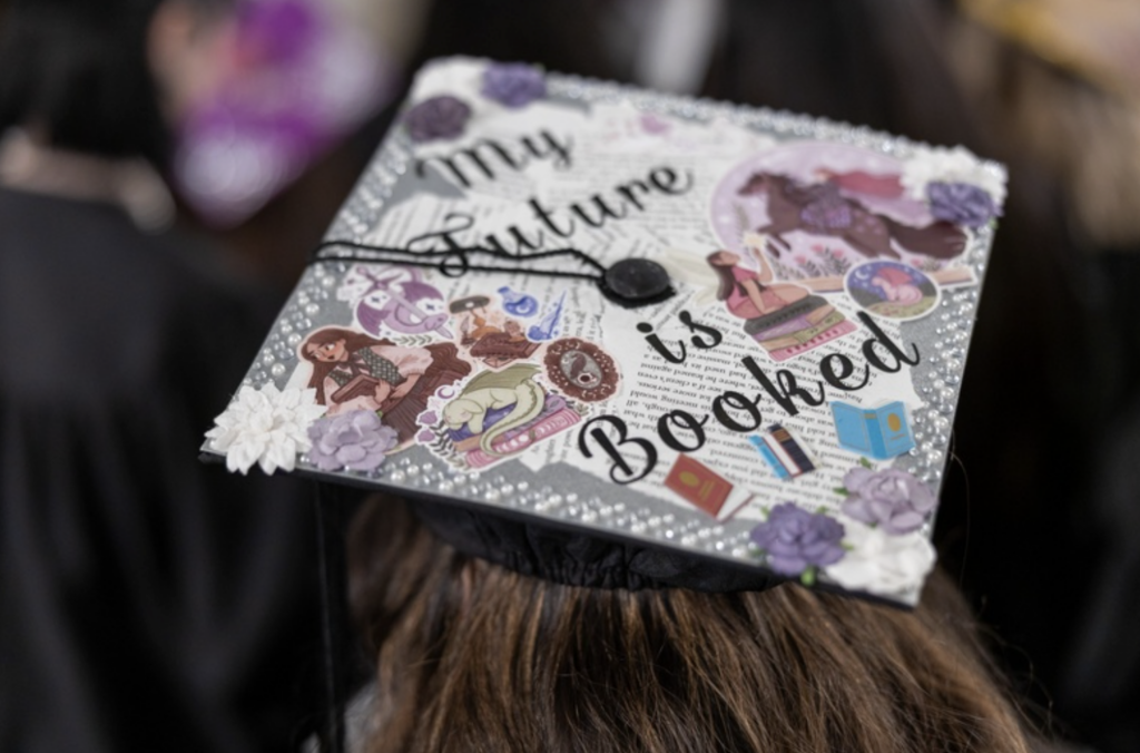 The top of a mortarboard that reads: My future is booked