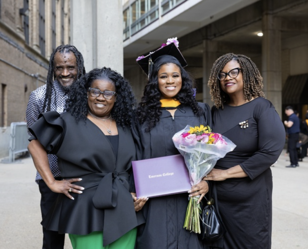 A graduate with three family members
